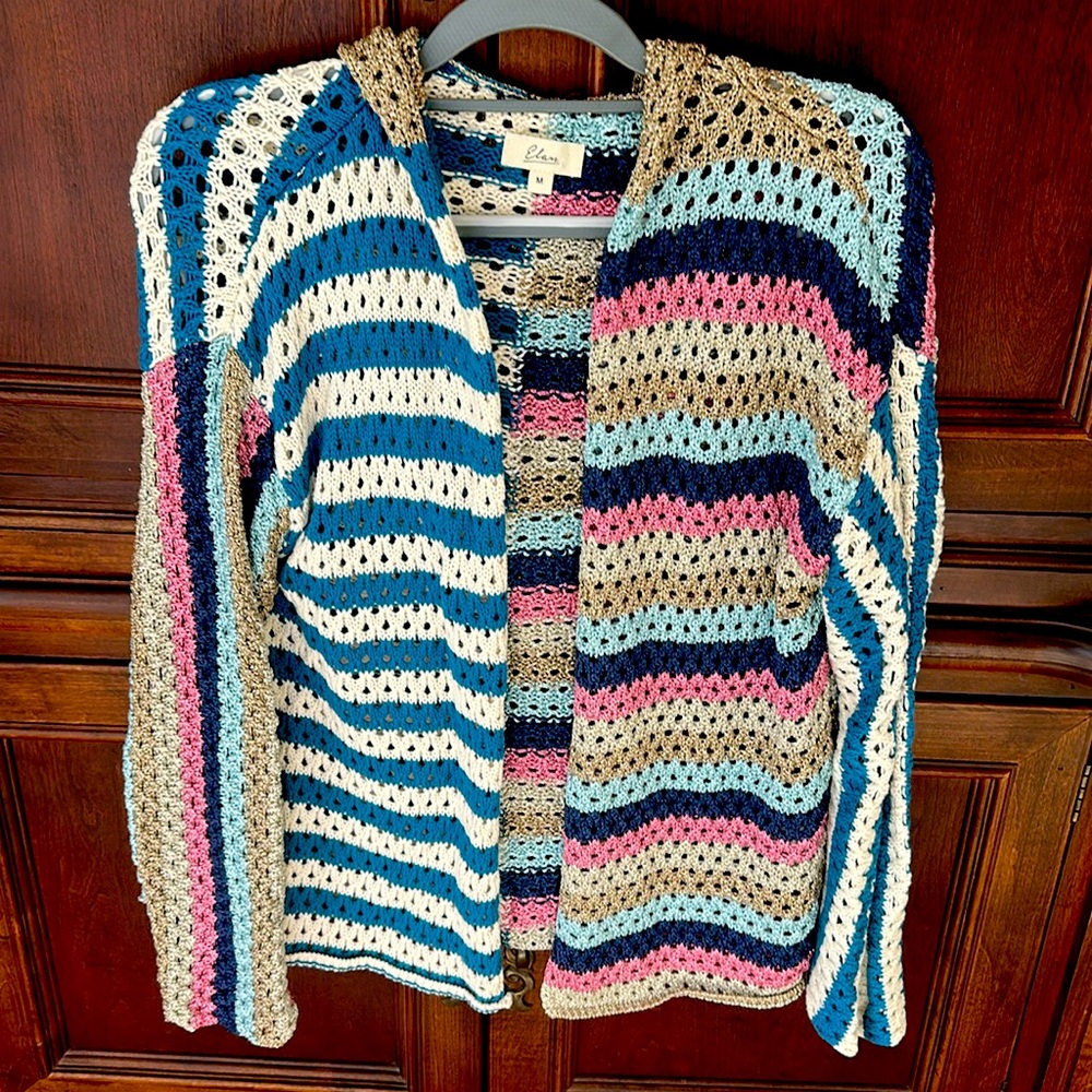 Unique multi colored with metallic crocheted cardigan with hood. Like new.